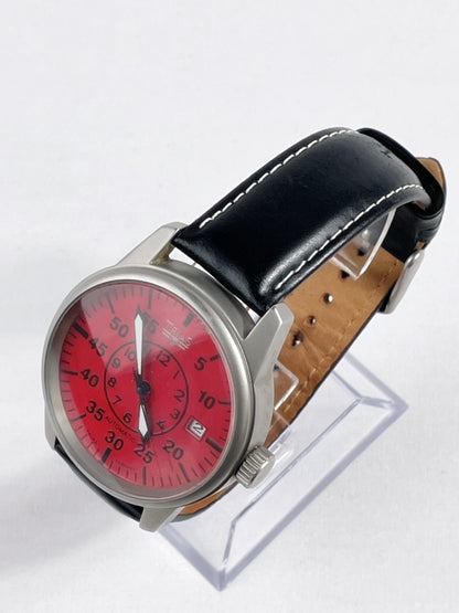 Trias Automatik Armbanduhr – Edelstahlgehäuse, rotes Zifferblatt, Lederarmband